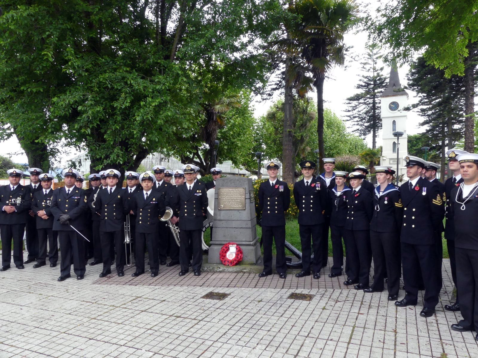 HMS Protector's crew with Chilean sailors from CNS Capitan Prat at the Coronel memorial in the namesake city HMS Protector's crew with Chilean sailors from CNS Capitan Prat at the Coronel memorial in the namesake city