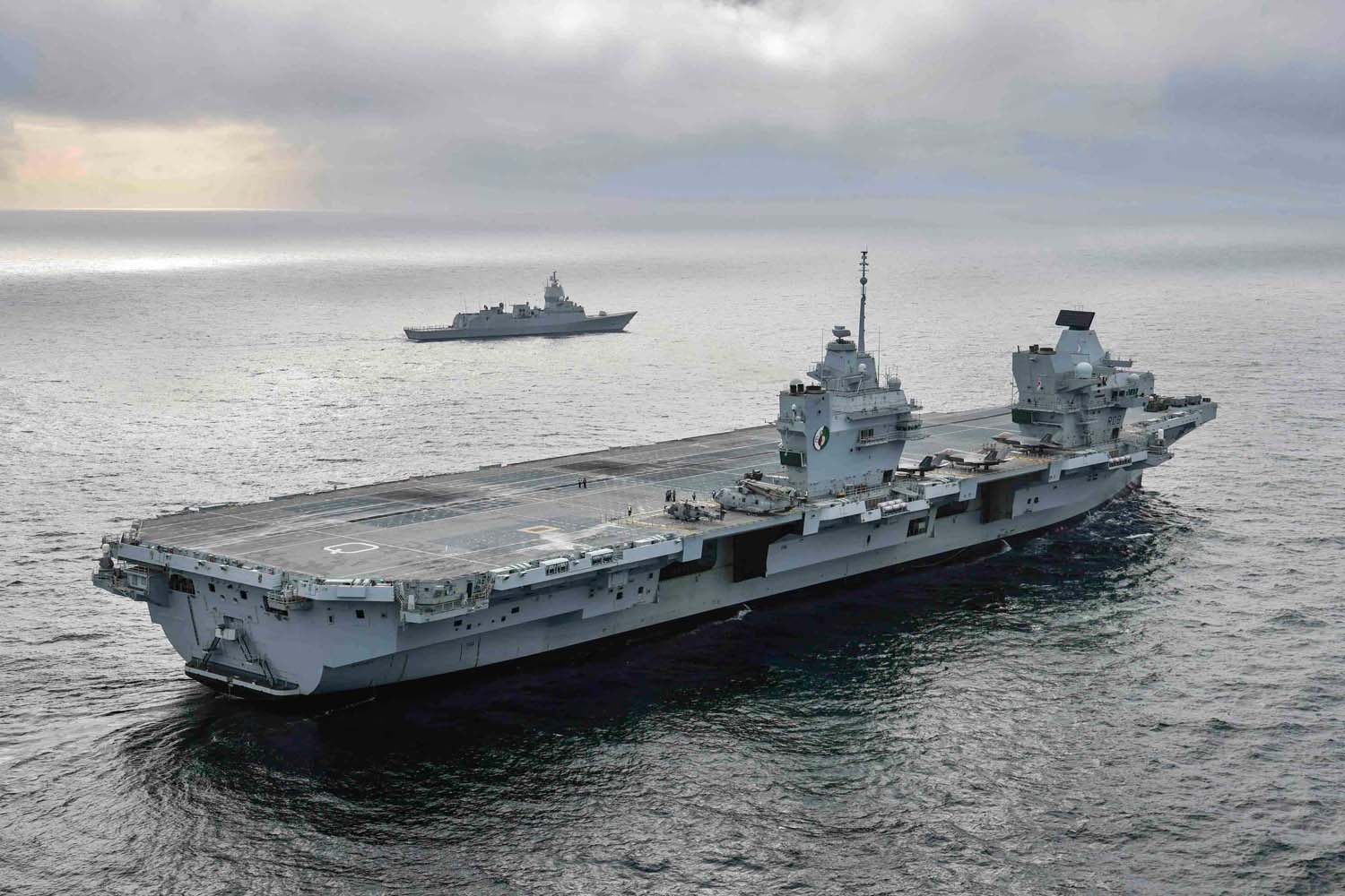 HMS Queen Elizabeth sailing alongside frigate HNoMS Otto Sverdrup. Picture: LPhot Belinda Alker