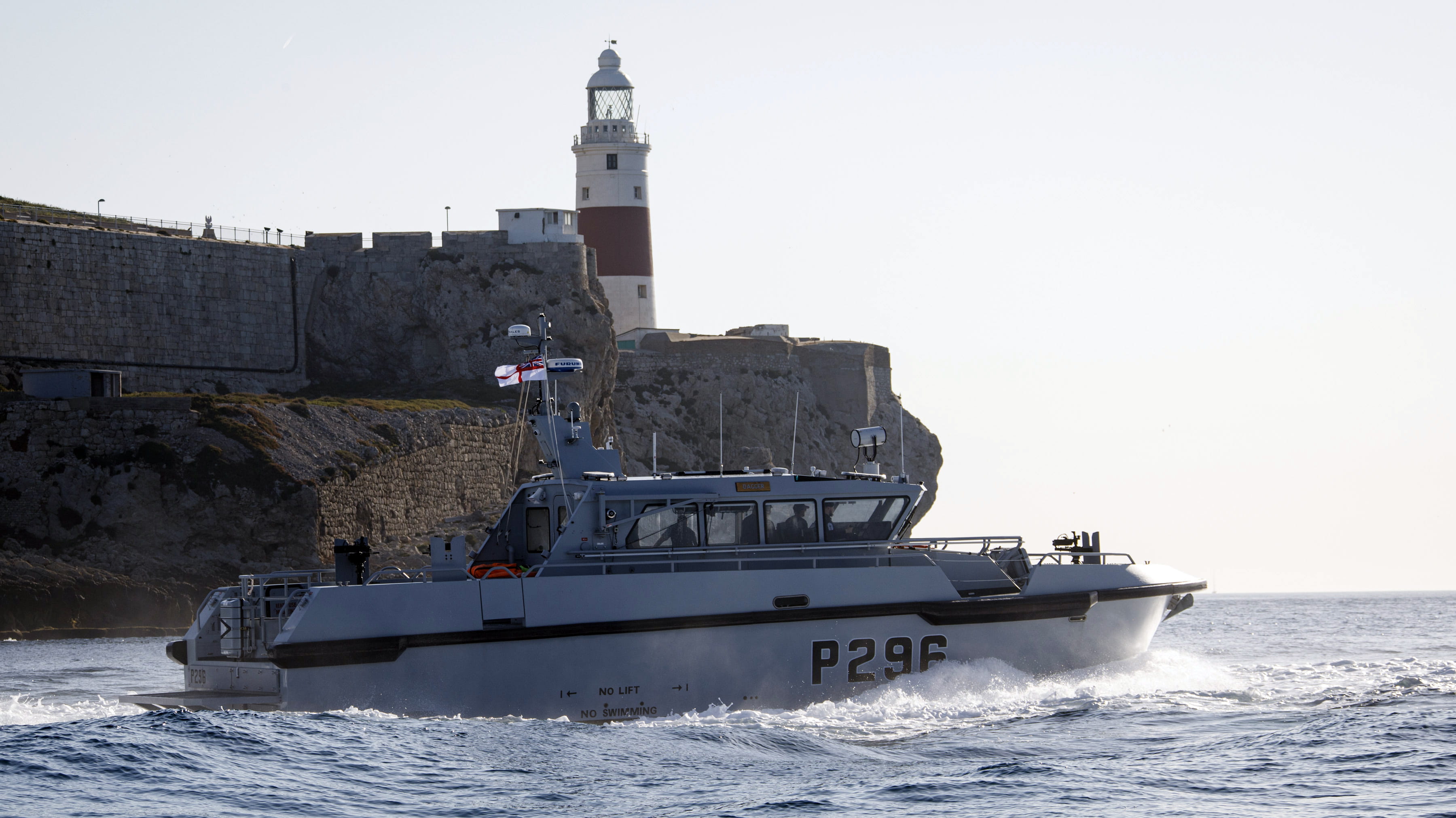 HMS Dagger passes the lighthouse at Europa Point HMS Dagger passes the lighthouse at Europa Point