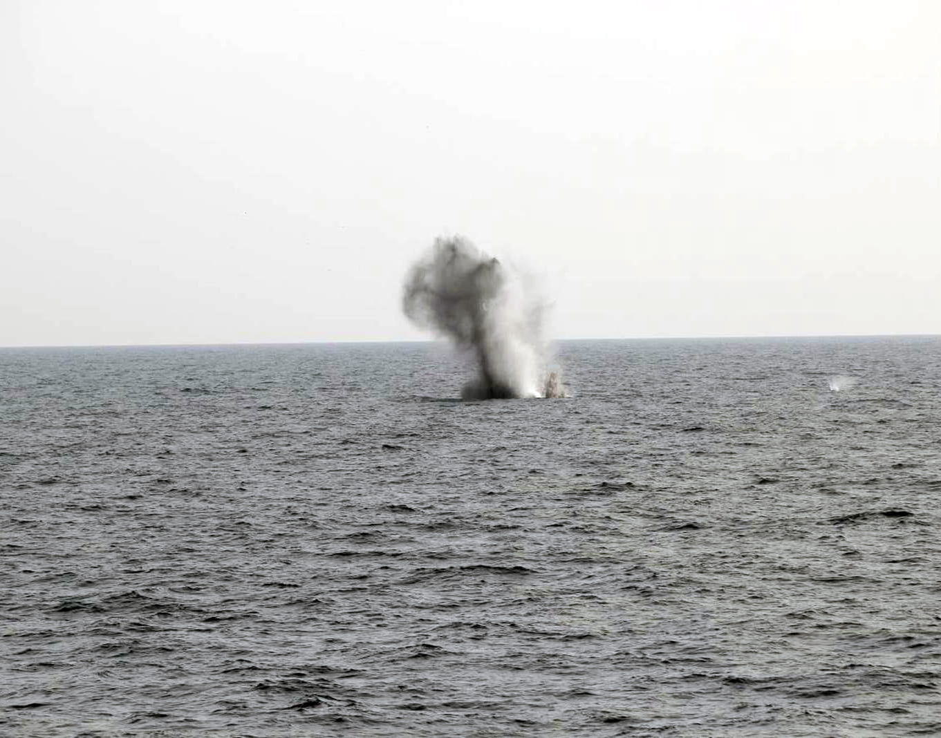 The buoy is blown to pieces by an explosive charge set by Shoreham's divers The buoy is blown to pieces by an explosive charge set by Shoreham's divers