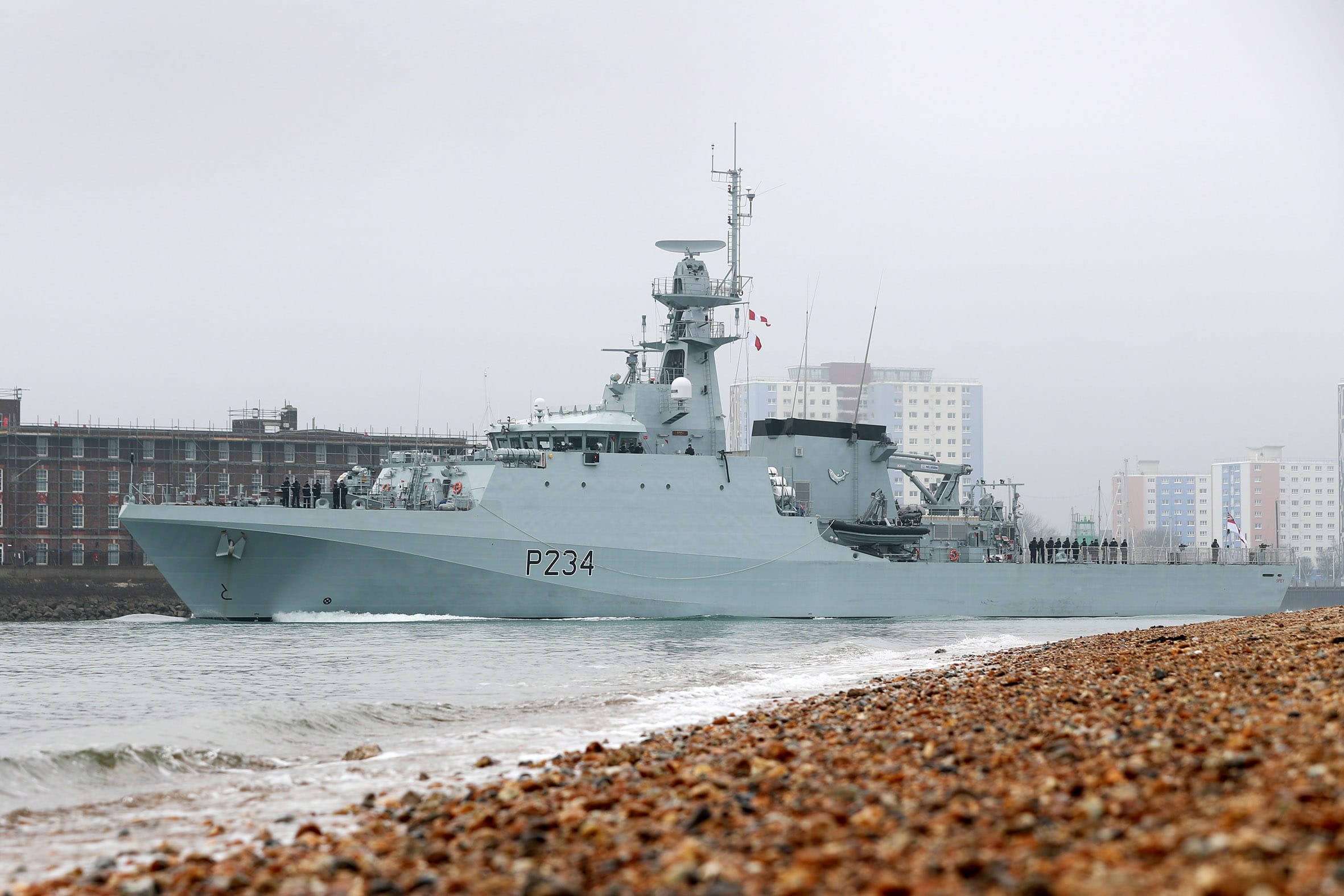 HMS Spey passes Fort Blockhouse on her first voyage under the White Ensign