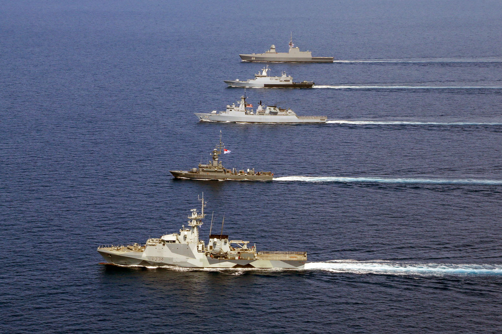 HMS Spey (nearest the camera) with Singaporean and Malaysian vessels