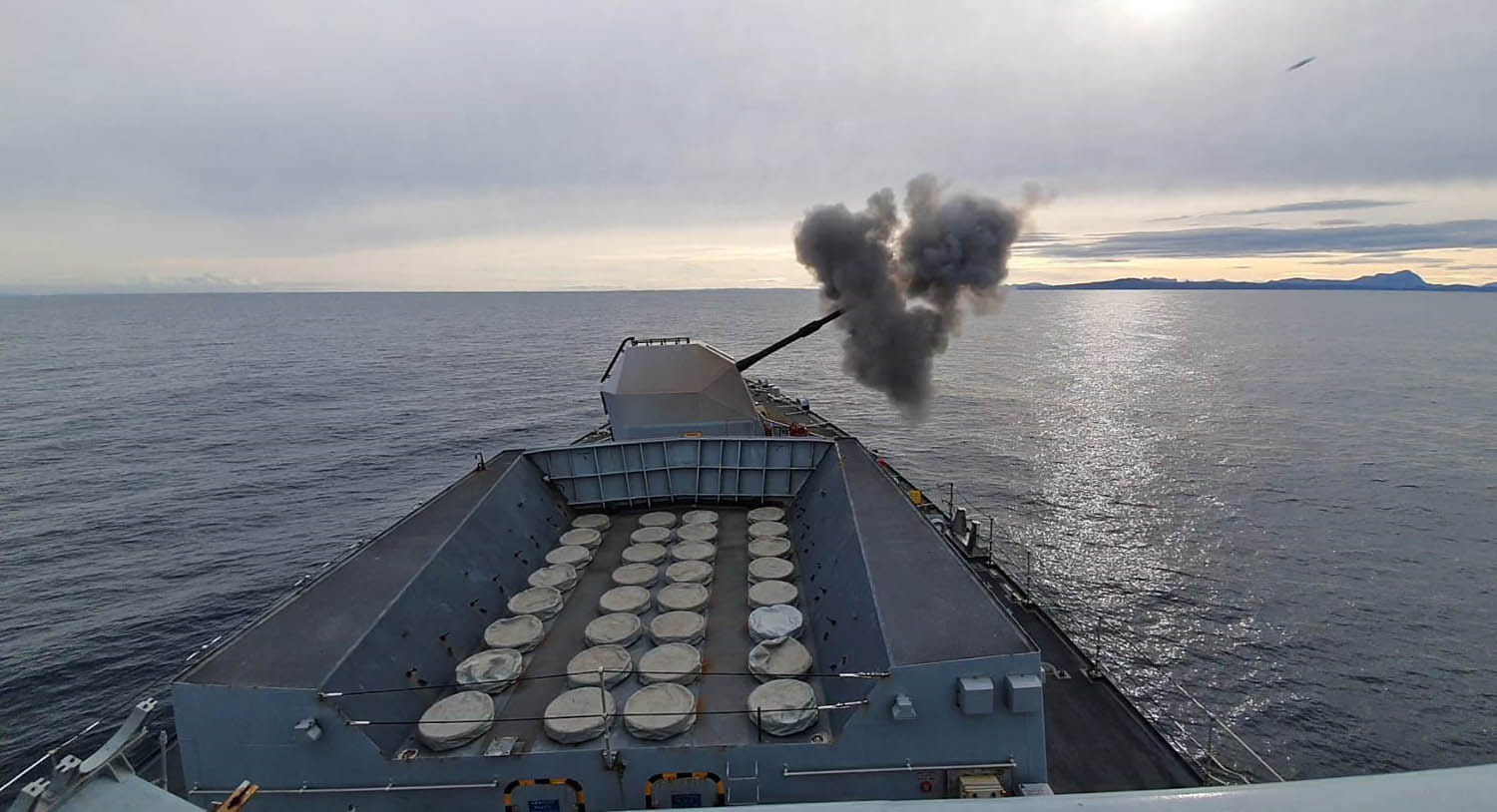 HMS Sutherland shows her flare in night shoot