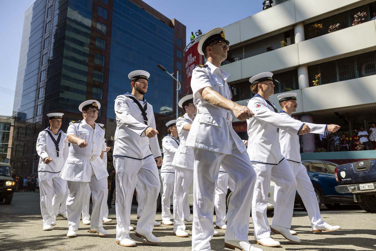 The contingent from HMS Tamar parade through the heart of Port Moresby