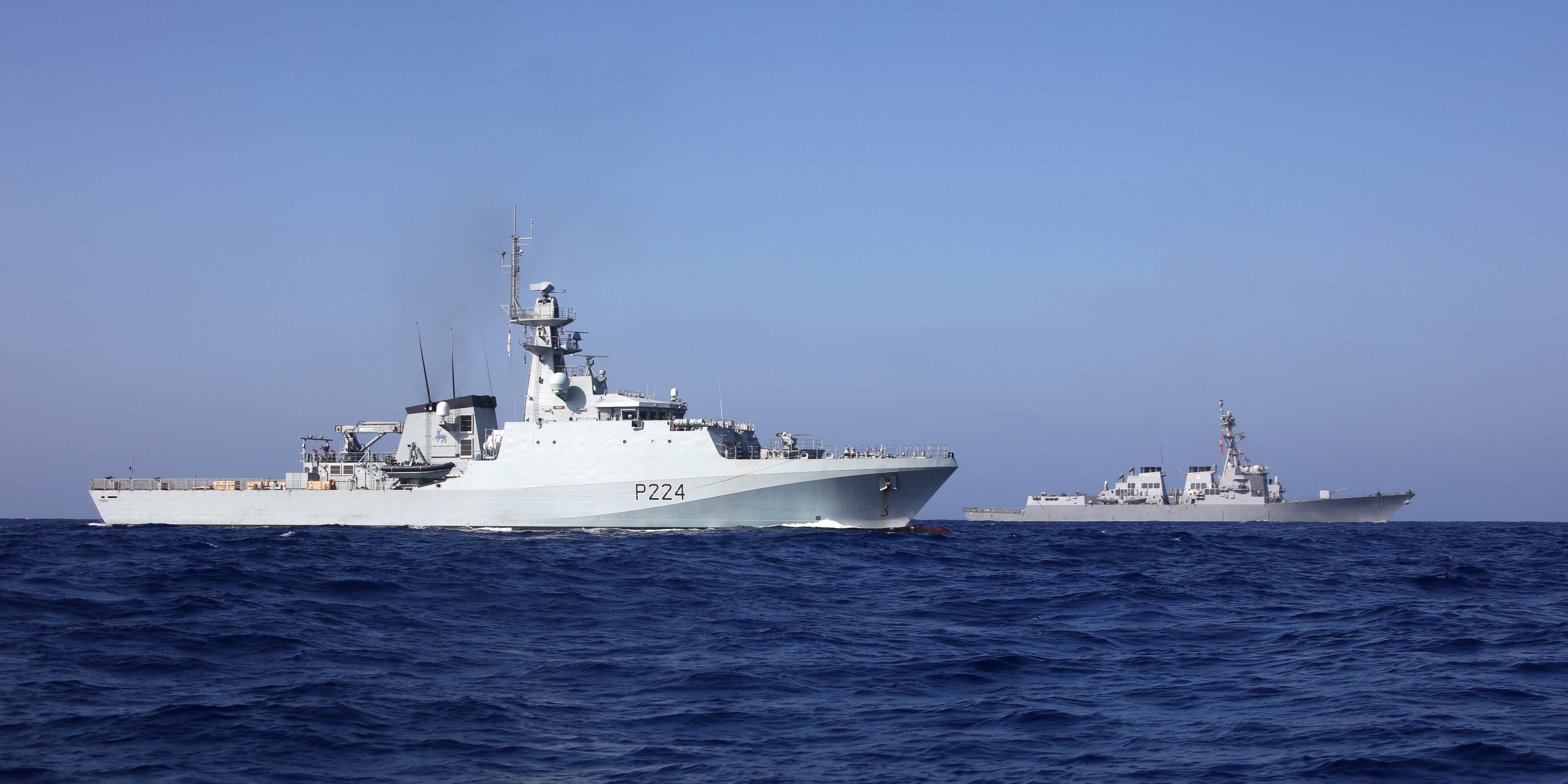 HMS Trent sails past the USS Winston Churchill. Picture: LPhot Luke