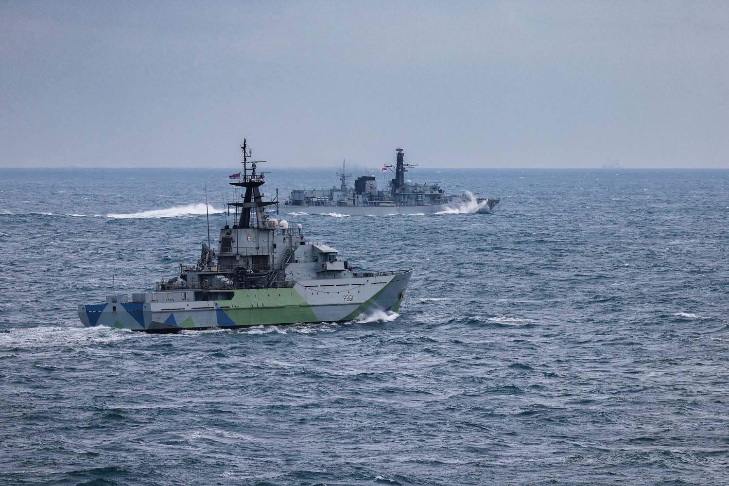 HMS Tyne foreground with frigate HMS Iron Duke shadowing Russian vessels in the Channel in February