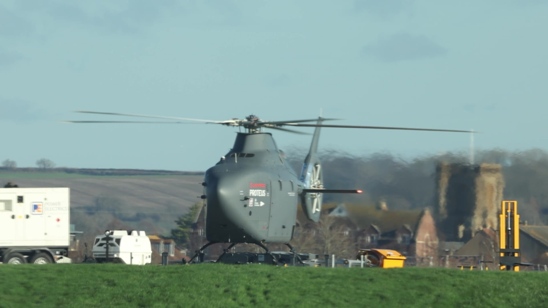 Rotors turn and lights flash on Proteus during her ground running