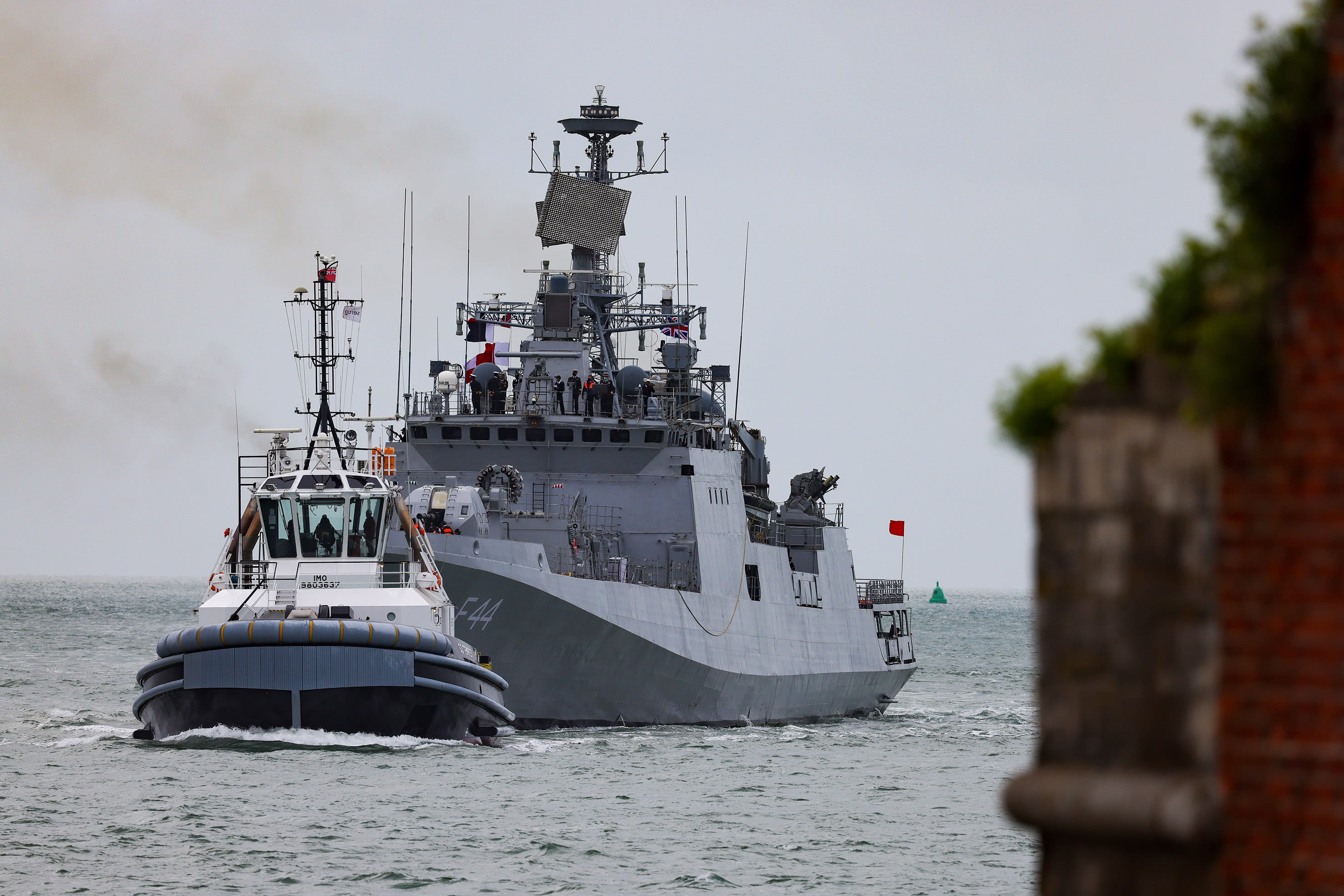 Super tug Tempest guides INS Tabar into Portsmouth Harbour Super tug Tempest guides INS Tabar into Portsmouth Harbour