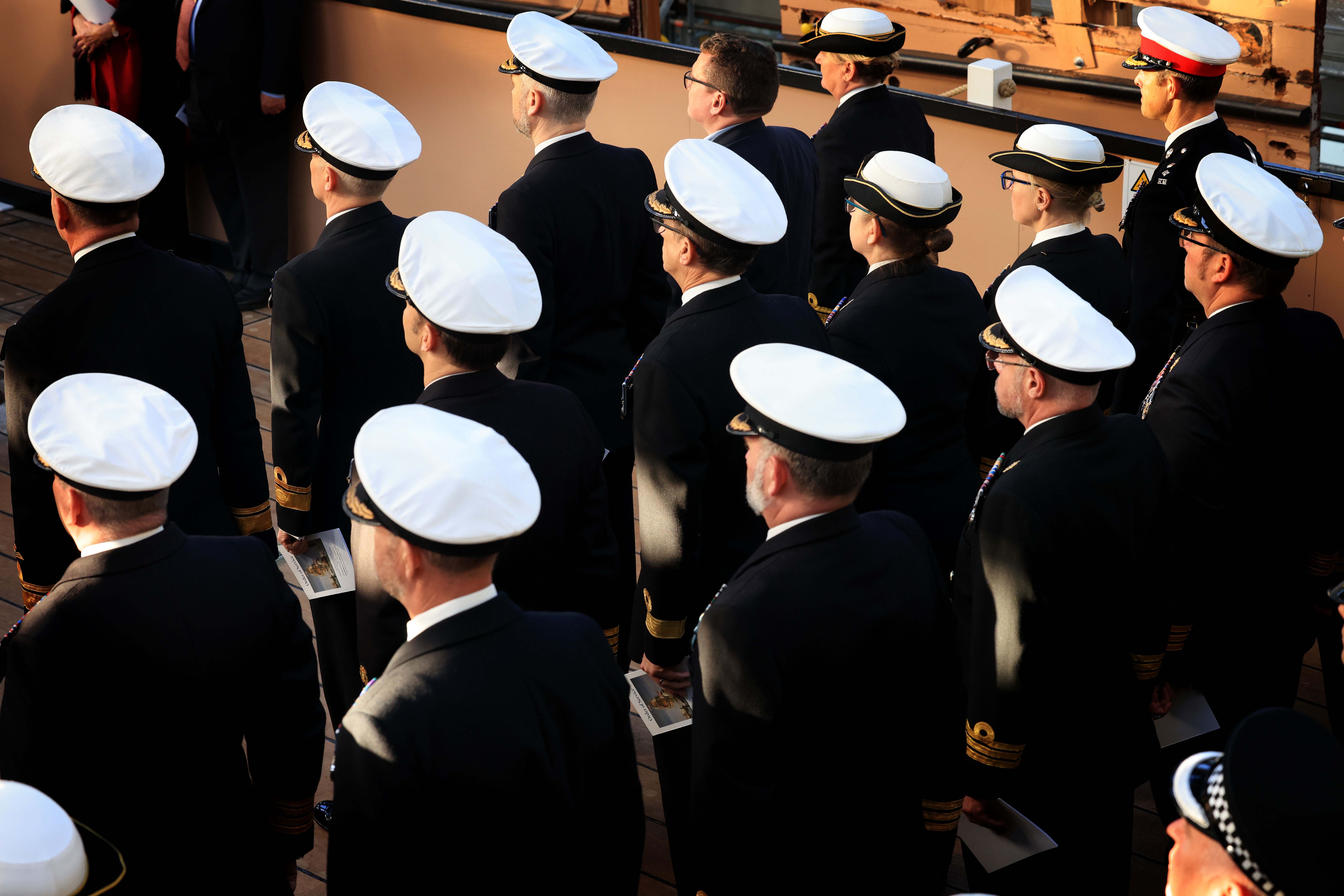 21 October 2025 - Royal Navy officers stood to attention during the ceremony 