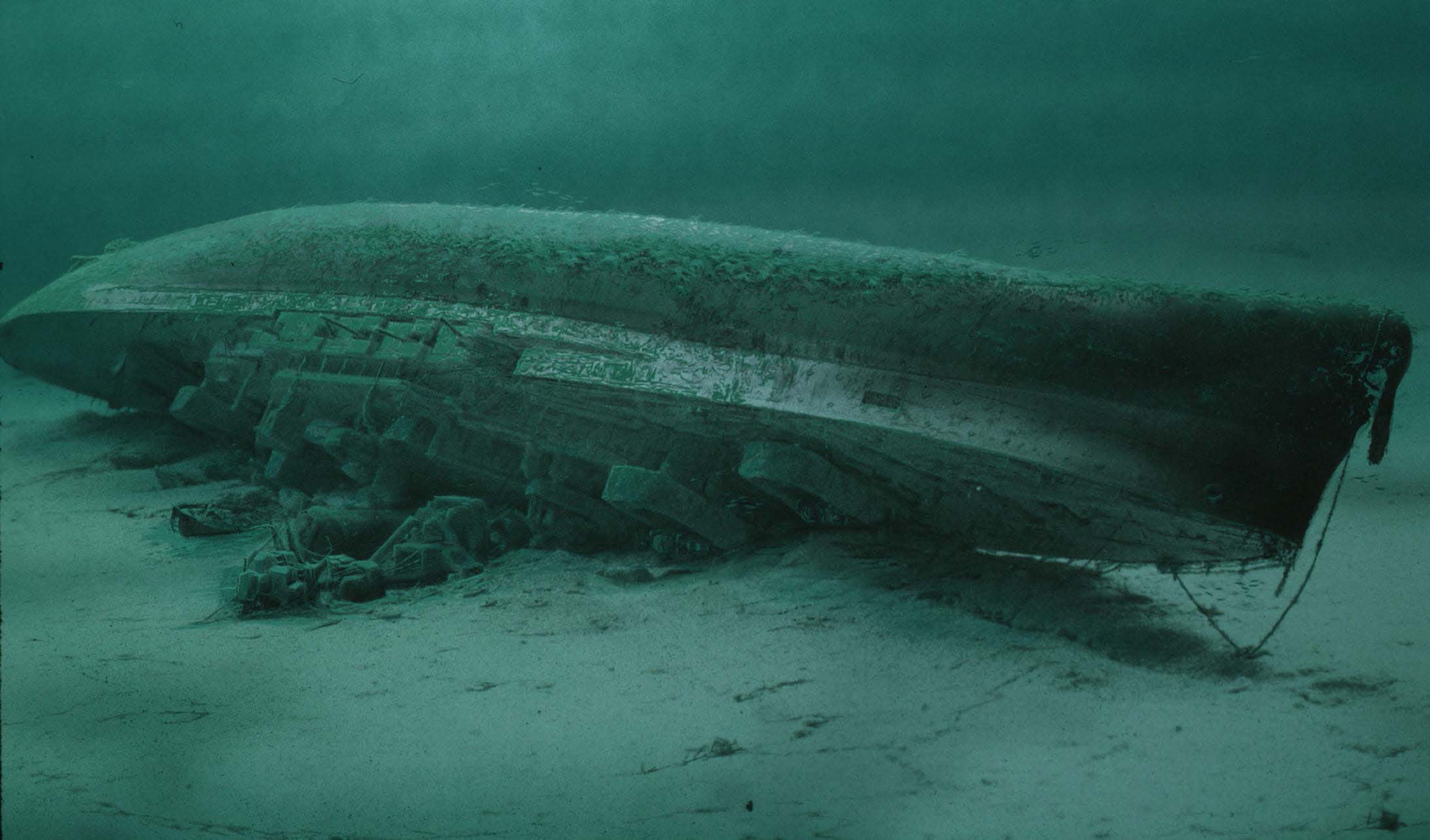 A computer graphic of the wreck of HMS Royal Oak uptrurned on rhe bed of Scapa Flow