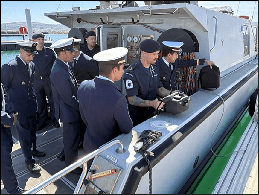 Moroccan Clearance Divers onboard DSB for hand-held sonar capability brief