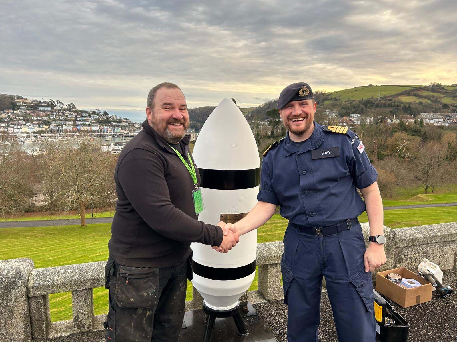 BRNCs Captain Andy Bray thanks the bombs restorer Greg Roland