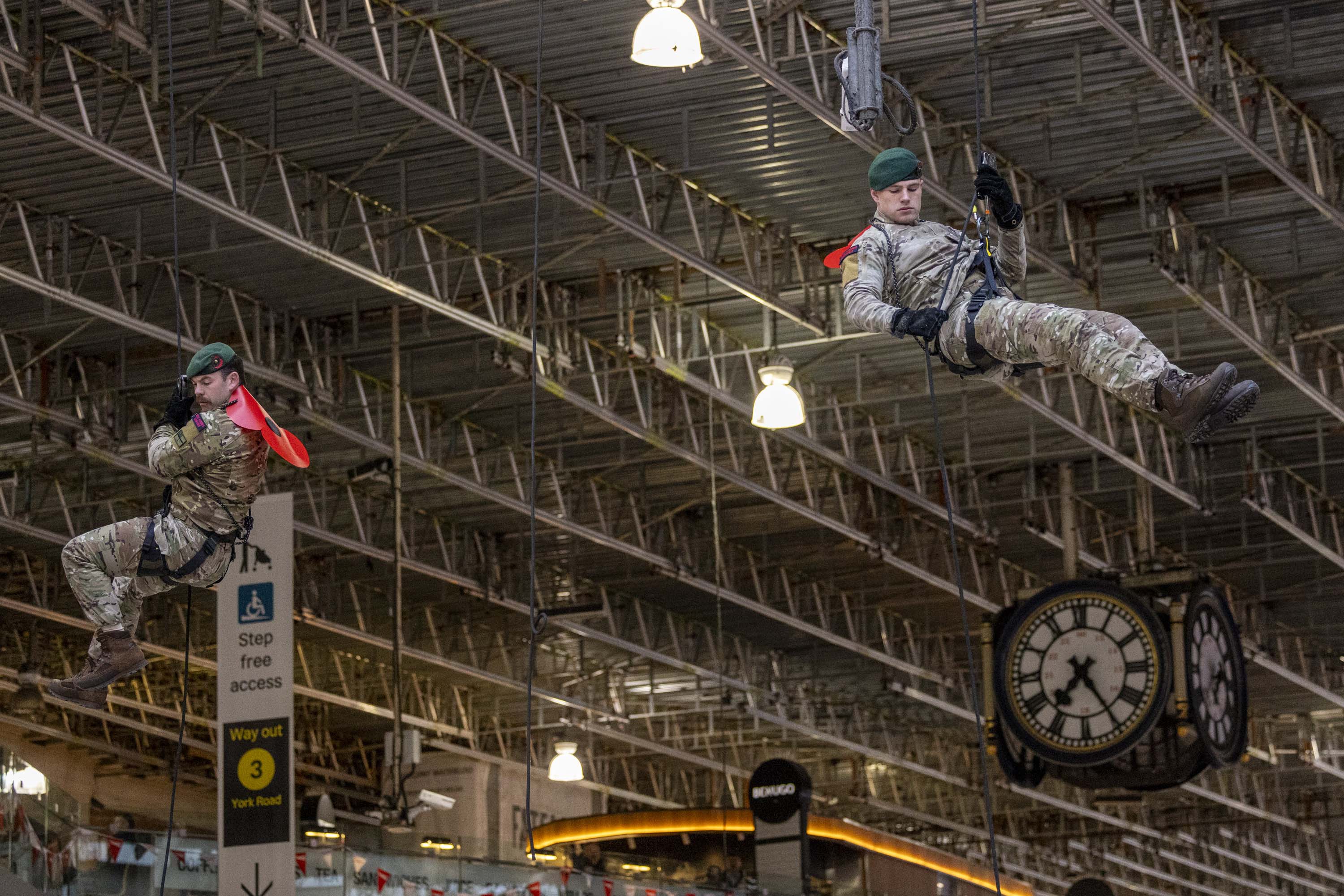The Royal British Legion’s London Poppy Day 2025 launches at Waterloo Station with Rob Rinder MBE, the Royal Marines abseil team and volunteer collectors from the Armed Forces hoping to raise £1million for the Poppy Appeal   Mandatory credit: © Royal British Legion. Photo by Rupert Frere