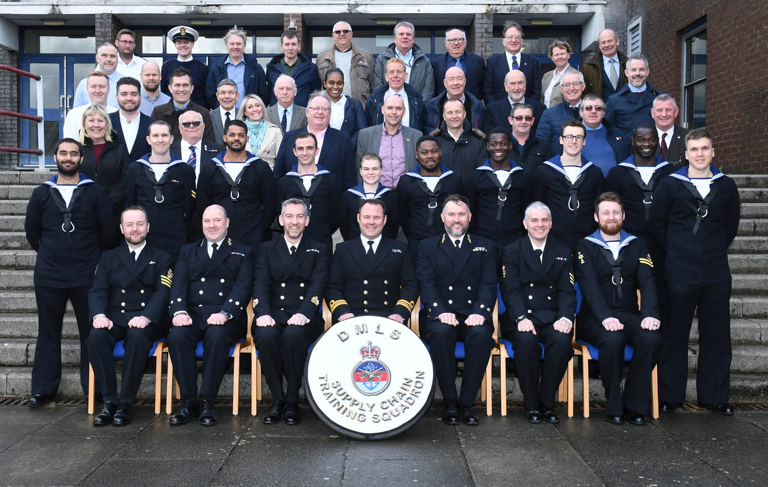 Instructors and Students return for final graduation