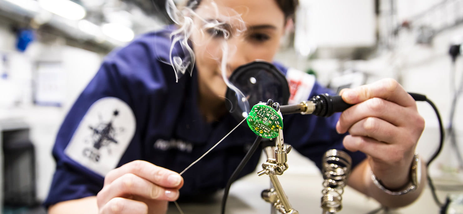 Engineering Technician Communications Information Systems (Weapons Engineer) Laura Suttle as she works to repair a telephone handset on board HMS Queen Elizabeth